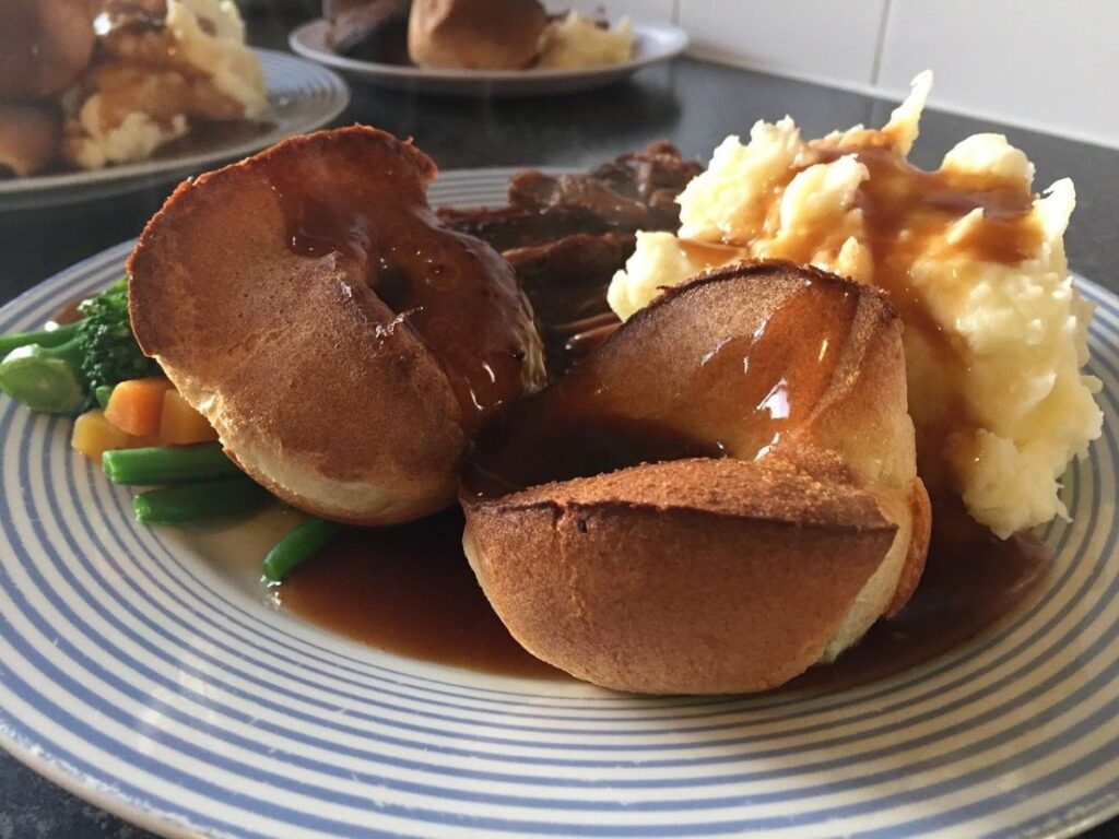 Roast dinner with yorkshire puddings and gravy