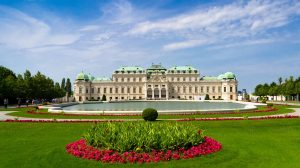 The Belvedere Palace Vienna - a white palace with gardens in front