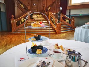 My table set for afternoon tea at the Titanic Museum in front of the Grand Staircase