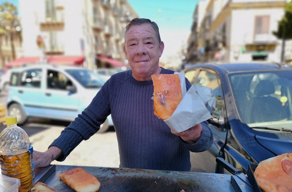 The Sfincione Pizza Seller in the Mercato del Capo Palermo