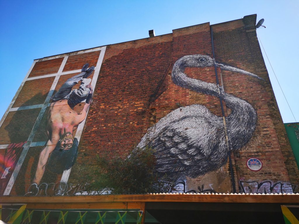 The Stork and Break Dancing Guard Street Art on Brick Lane