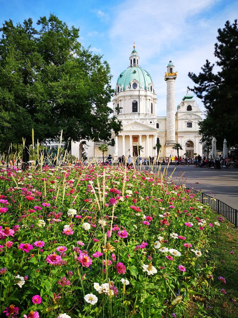 Pretty gardens in front of Kalrskirche in Vienna