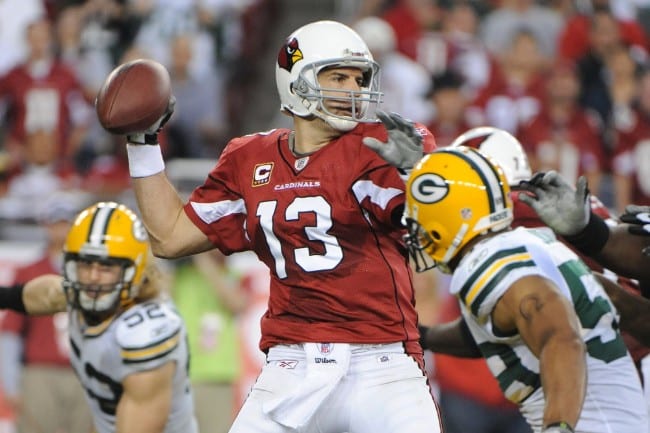 American football player throwing a ball - The Arizona Cardinals in Action