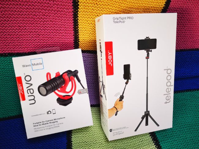 The Wavo Mobile Mic and JOBY TelePod in the Boxes with a colourful checked Blanket background