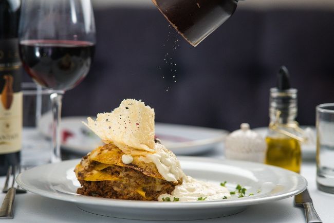 Plated dish of food on a restaurant table - Enjoy Delicious Food in Toronto with Winterlicious