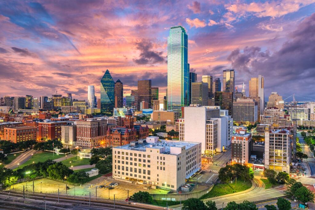Dallas Skyline at Sunset with Pink and Purple Clouds - Free Things to do in Dallas Texas - Dallas on a Budget