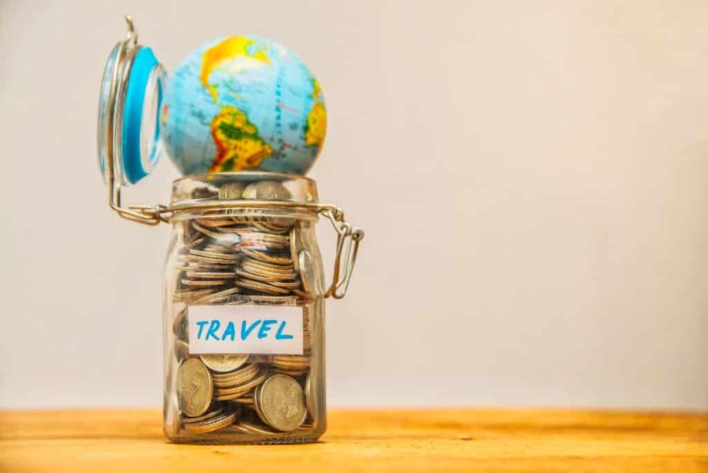How to Travel For Free - The World in a Travel Savings Jar