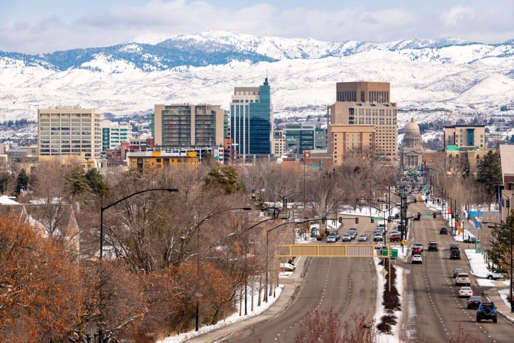 Boise Idaho in Winter - City skyline with snow on the mountains beyond