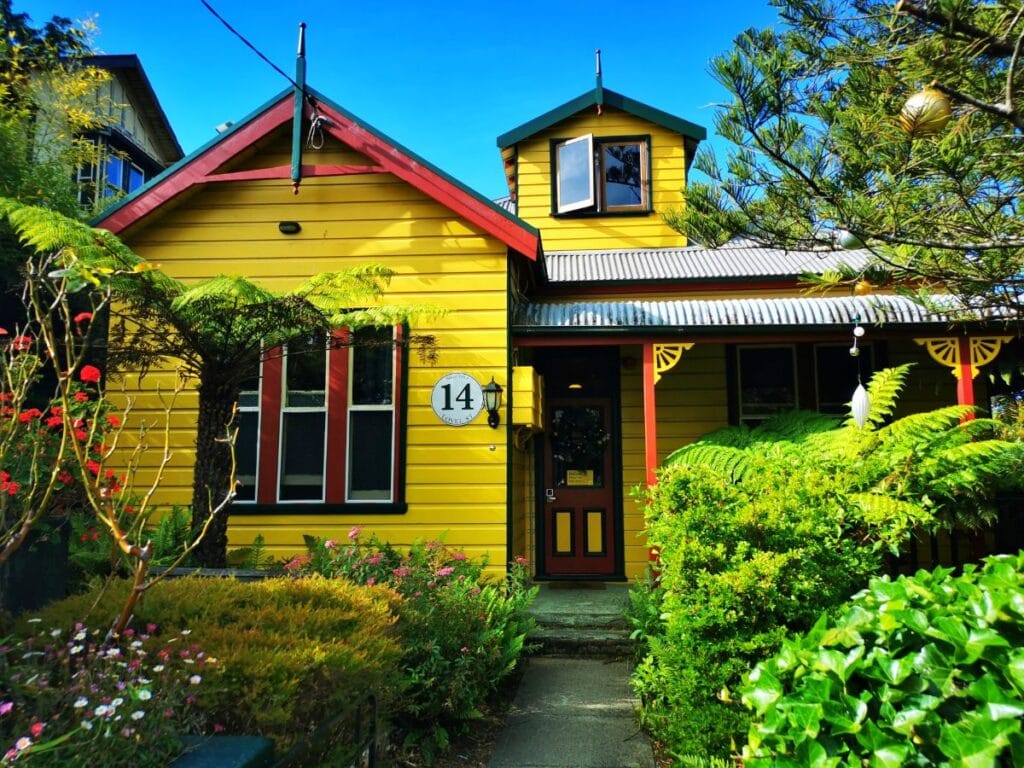 Bright yellow painted building No 14 Lovel Street - A Great Place to Stay in the Blue Mountains
