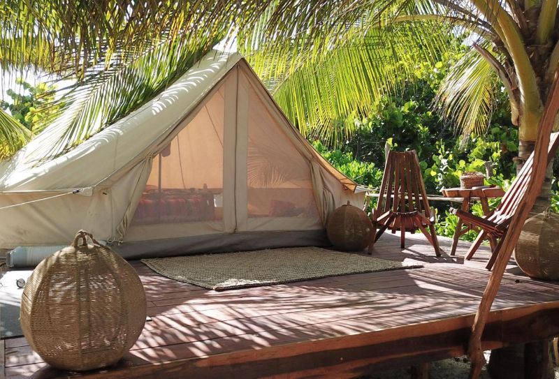 A luxury tent at Camp Ikal Tulum - affordable beach hotels in Tulum
