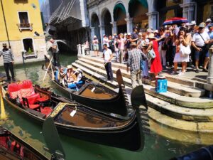 Tourists Waiting for a Gondola Ride in Venice - What Not to Do in Venice